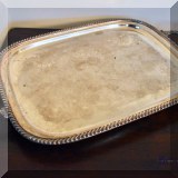 S45. Footed rectangular silverplate tray with handles. 22” x 13.5” - $24 